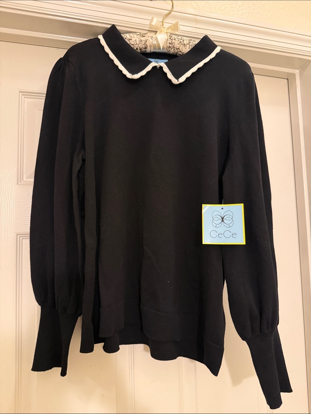 CeCe Black Knit Sweater with Cream Scalloped Collar